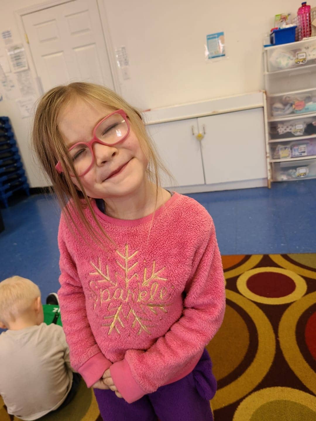 Child smiling at Mini Adventures Preschool in Warrensburg MO