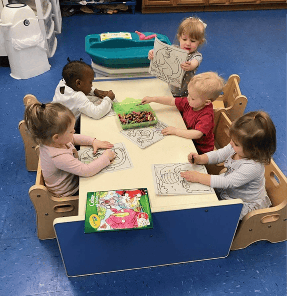 Children engaging in play-based learning at Mini Adventures Preschool, Warrensburg MO.
