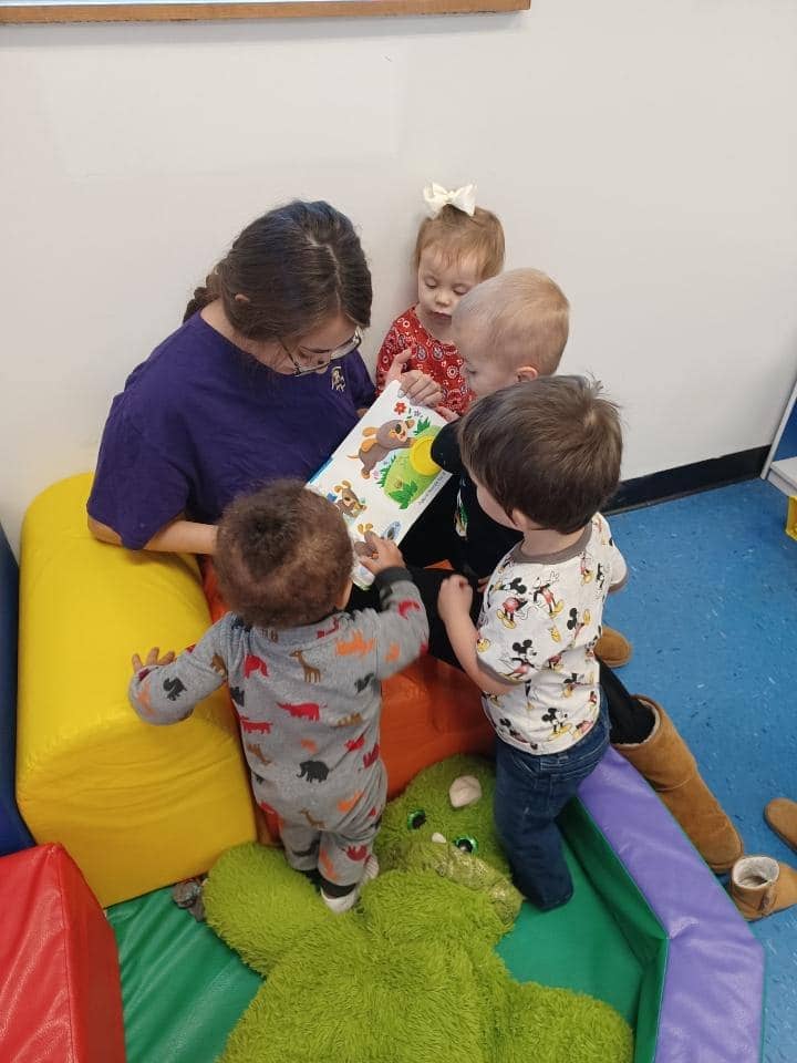 Children enjoying storytime at Mini Adventures Preschool in Warrensburg, MO.