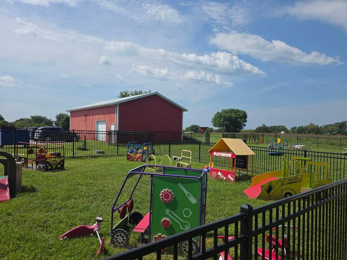 Children playing outside at Mini Adventures Preschool in Warrensburg, Missouri.